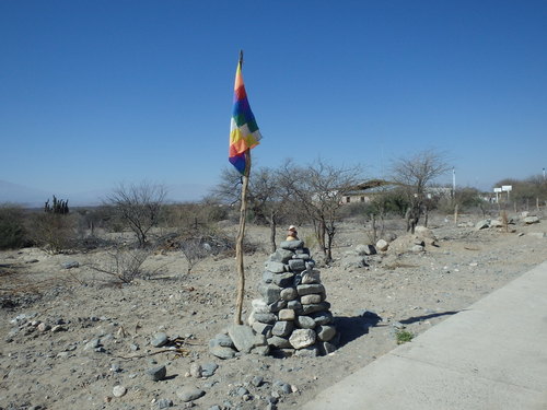 A Rock Cairn with an Inca Flag.